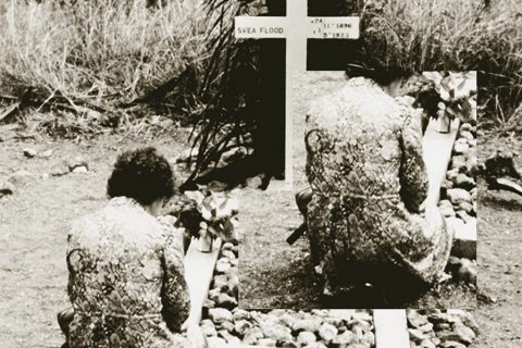 Aggie Hurst prays at her mother’s gravesite